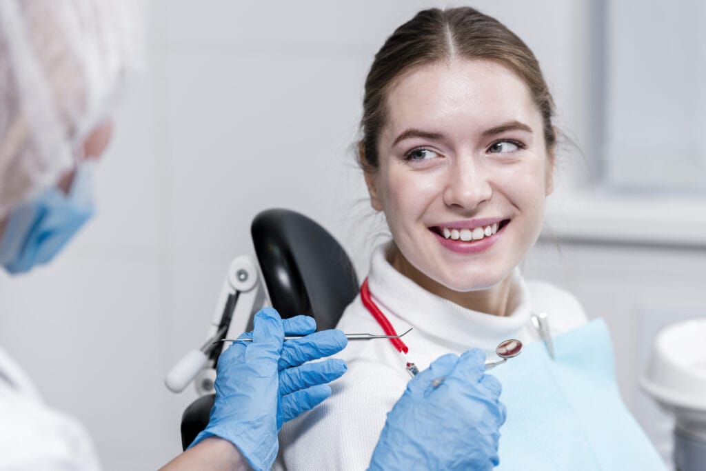 young-woman-at-dentist’s-office-discussing-advanced-platelet-rich-fibrin-(A-PRF⁺)-for-dental-implants-treatment